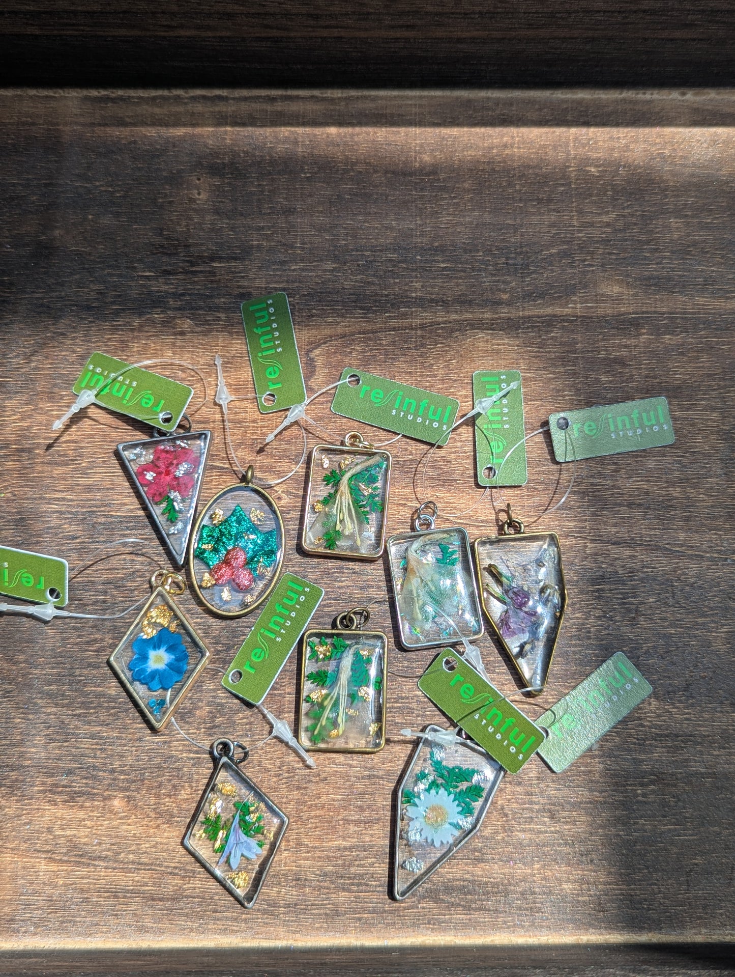 Floral inclusion pendants