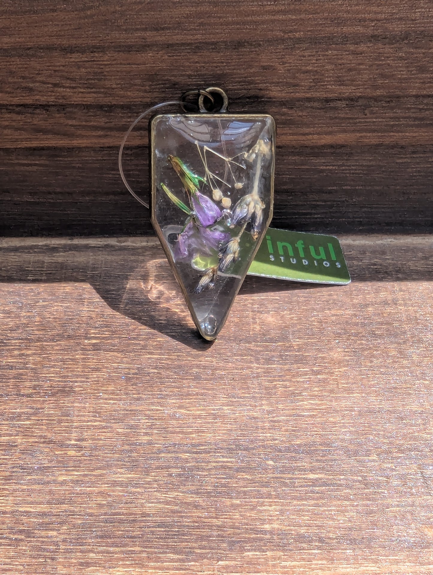 Floral inclusion pendants