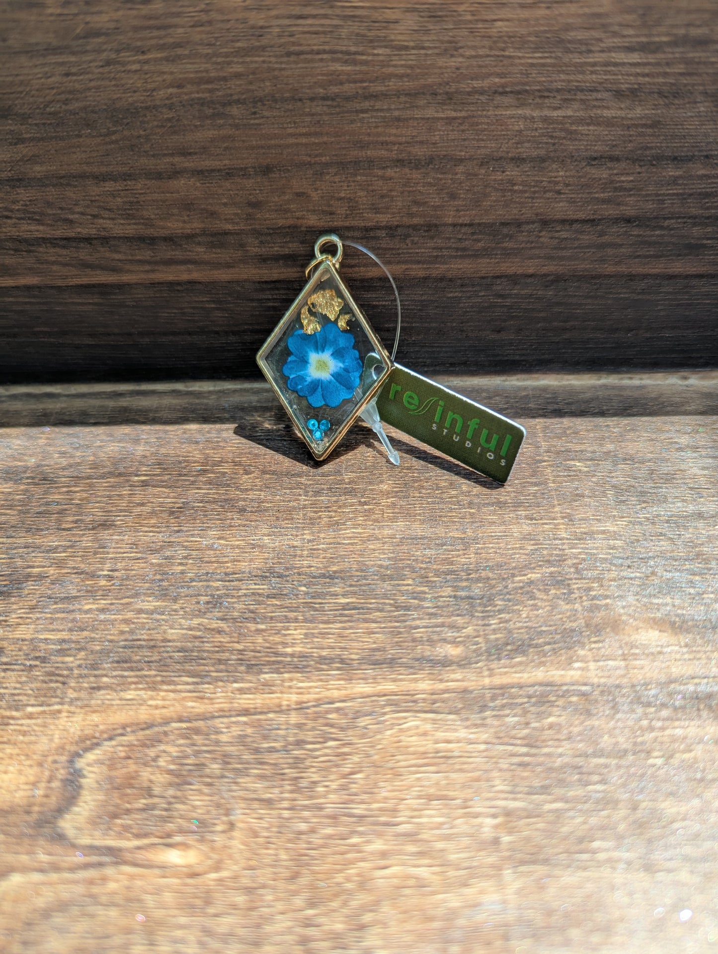 Floral inclusion pendants