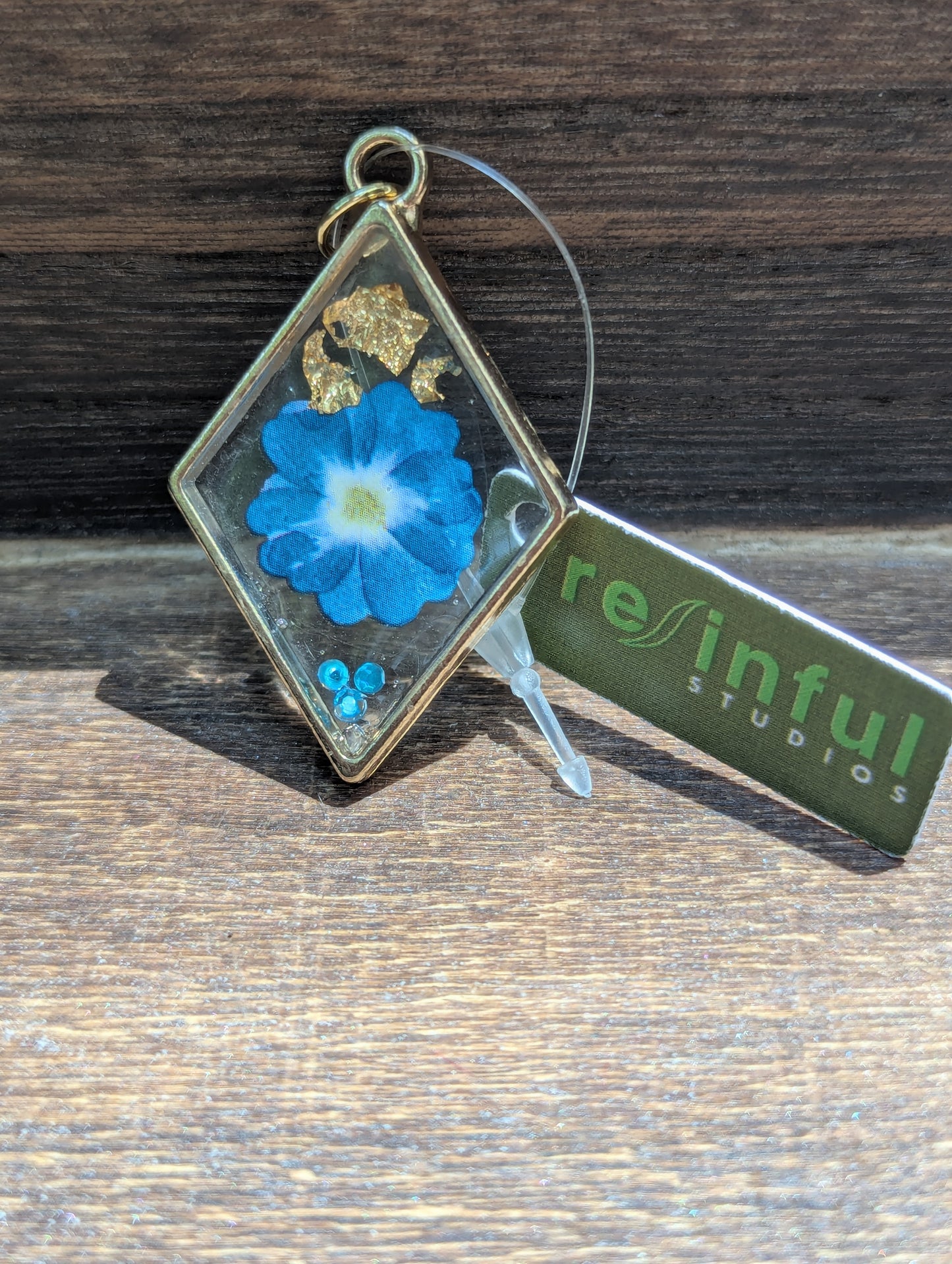 Floral inclusion pendants