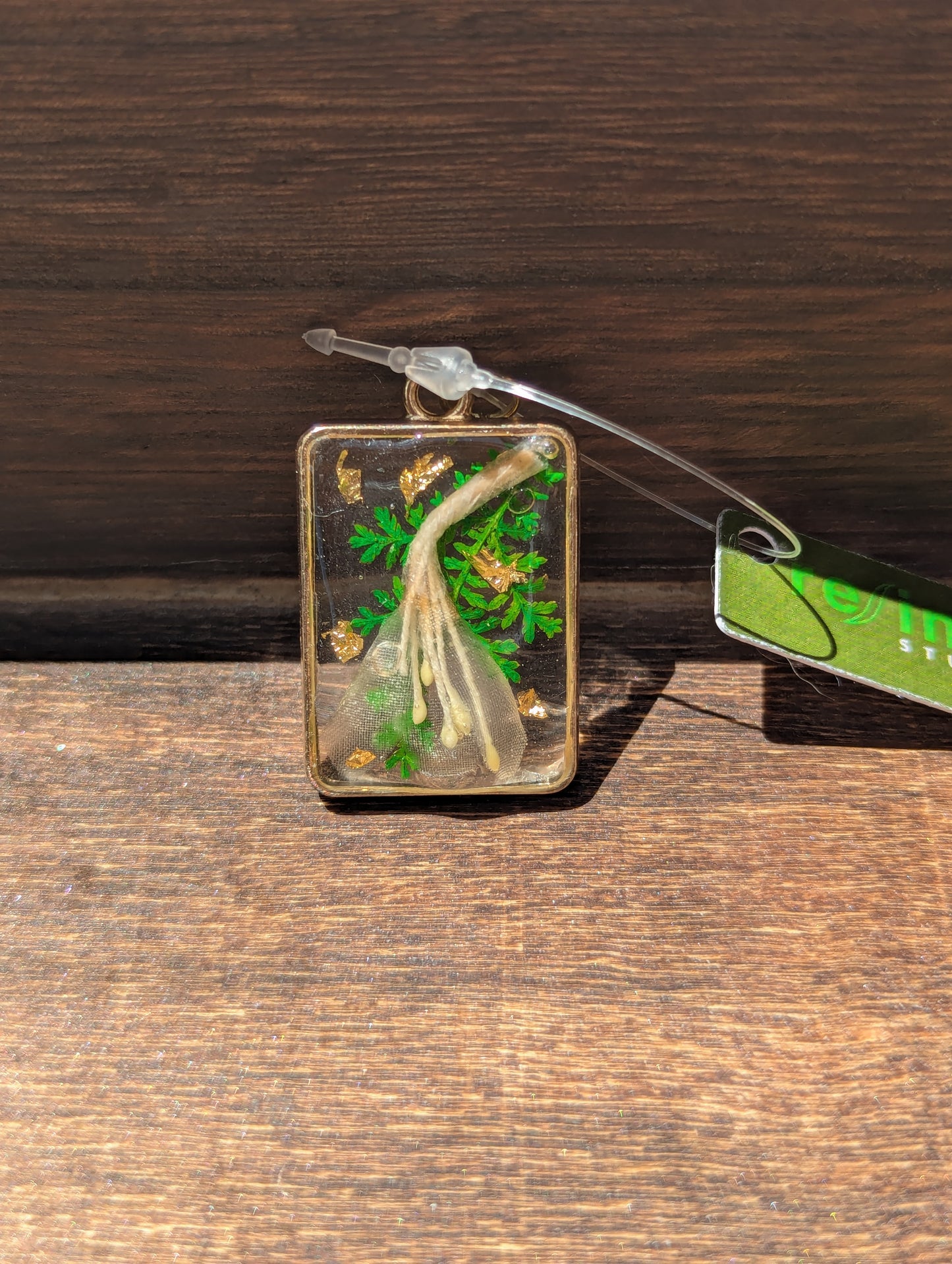 Floral inclusion pendants
