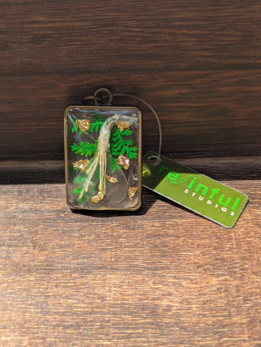 Floral inclusion pendants