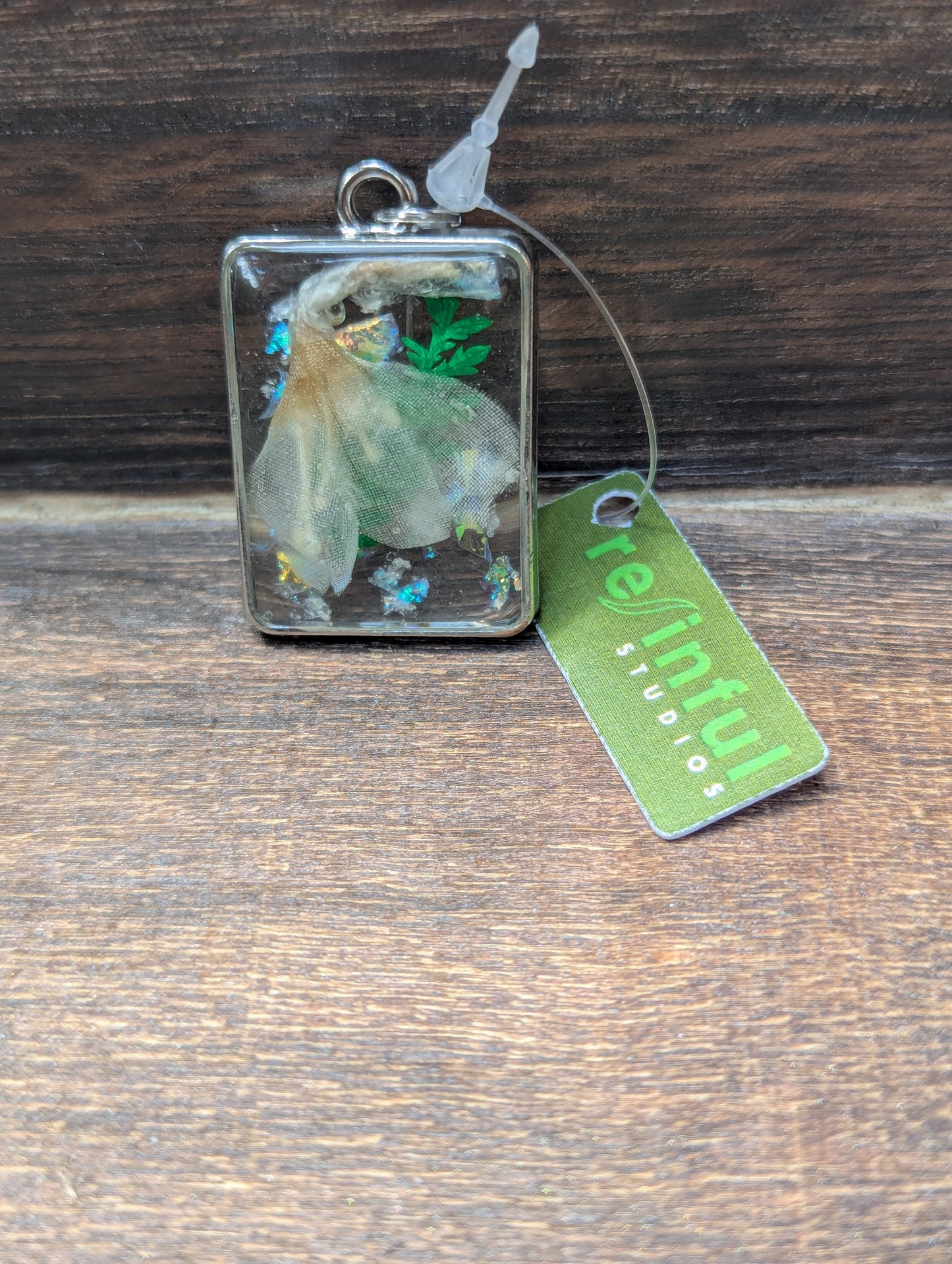 Floral inclusion pendants