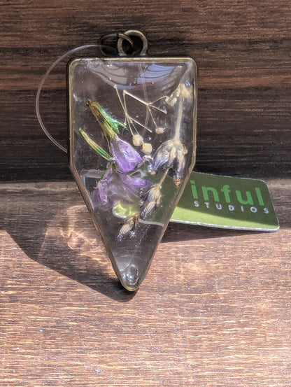 Floral inclusion pendants