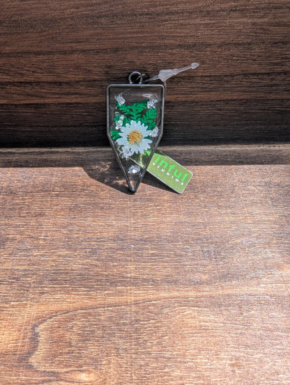 Floral inclusion pendants