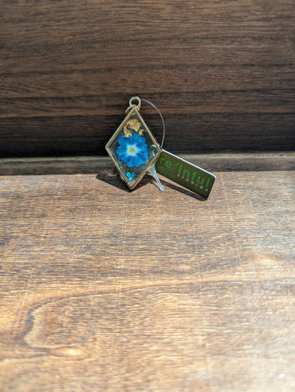 Floral inclusion pendants