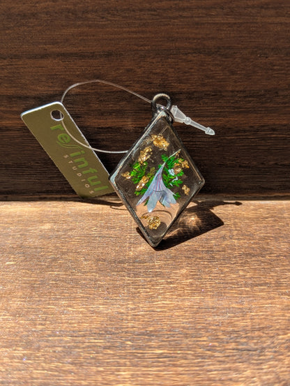 Floral inclusion pendants