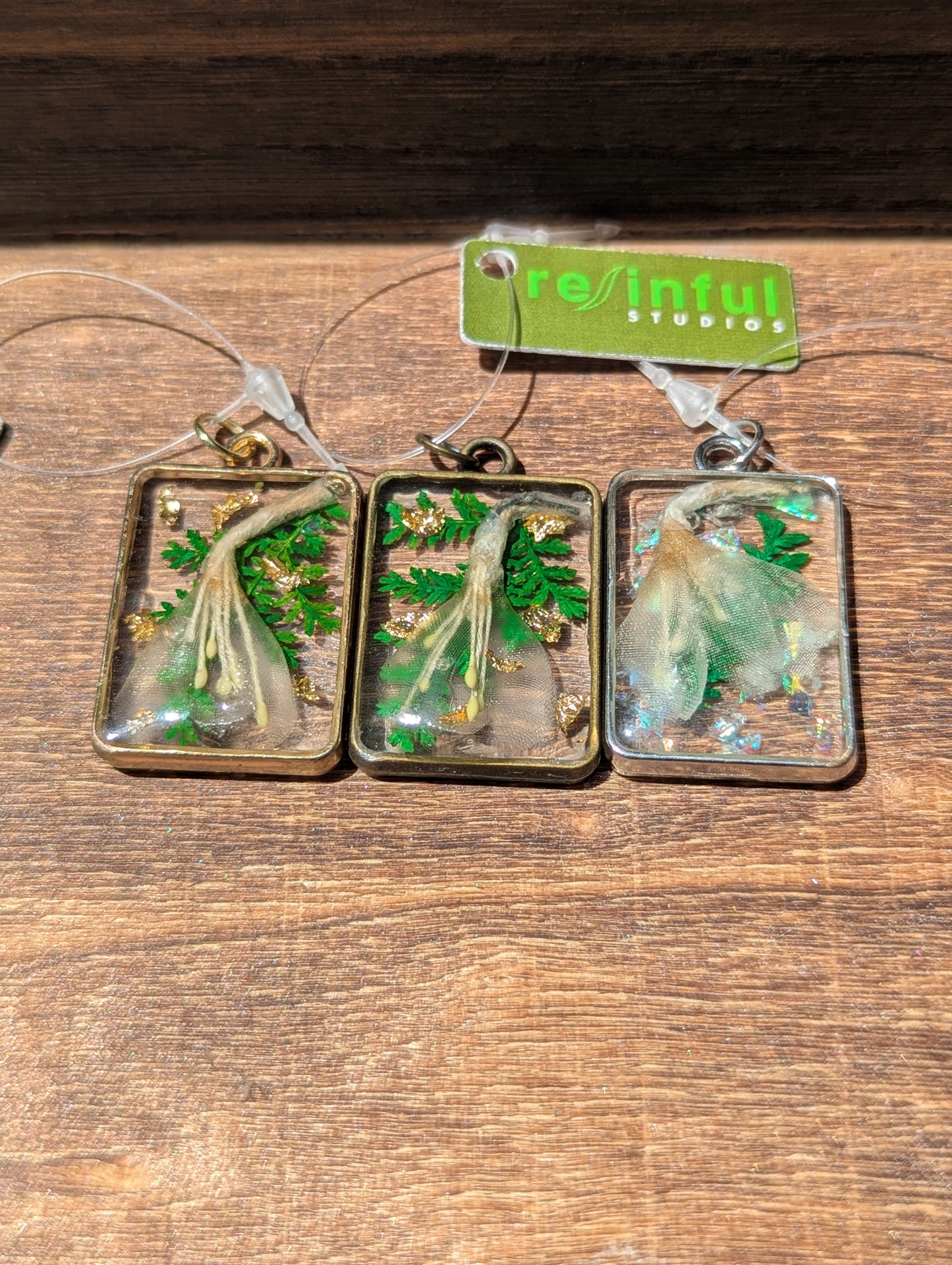 Floral inclusion pendants