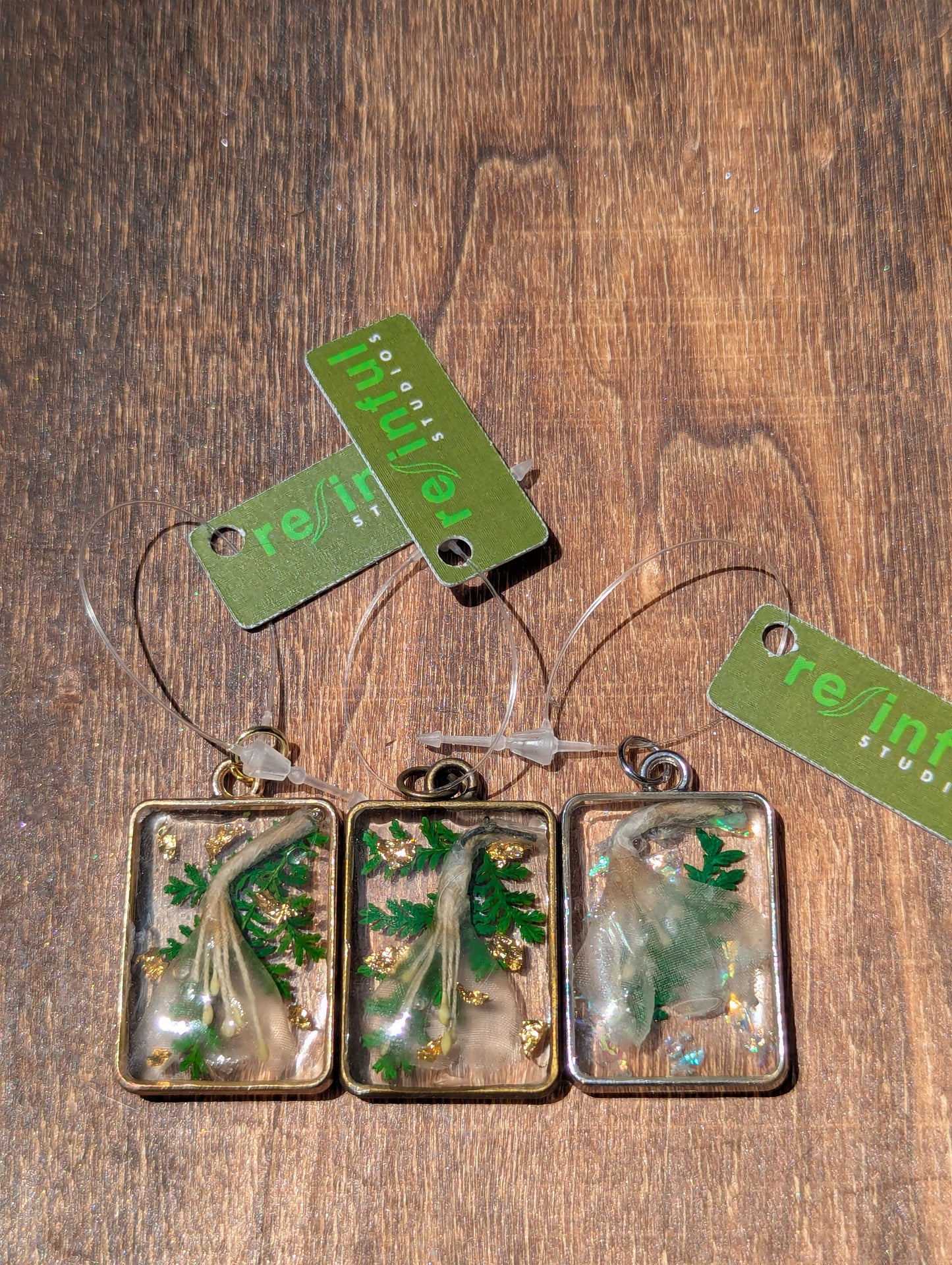 Floral inclusion pendants