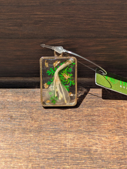 Floral inclusion pendants